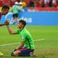 Indonesia's Irfan Jaya (left) consoles Singapore's Ikhsan Fandi after the second leg of the AFF Suzuki Cup semi-final