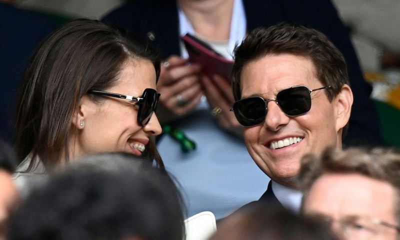 US actor Tom Cruise (right) watches the women's singles final at Wimbledon