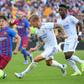 Midfielder Gavi (L) was the youngest Barcelona starter in a Clasico for almost 100 years