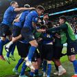 Italy players celebrate after beating Spain on penalties in their Euro 2020 semi-final at Wembley