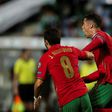 Cristiano Ronaldo (R) scored a dramatic late double to take his tally to 111 international goals