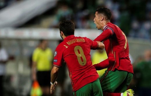 Cristiano Ronaldo (R) scored a dramatic late double to take his tally to 111 international goals