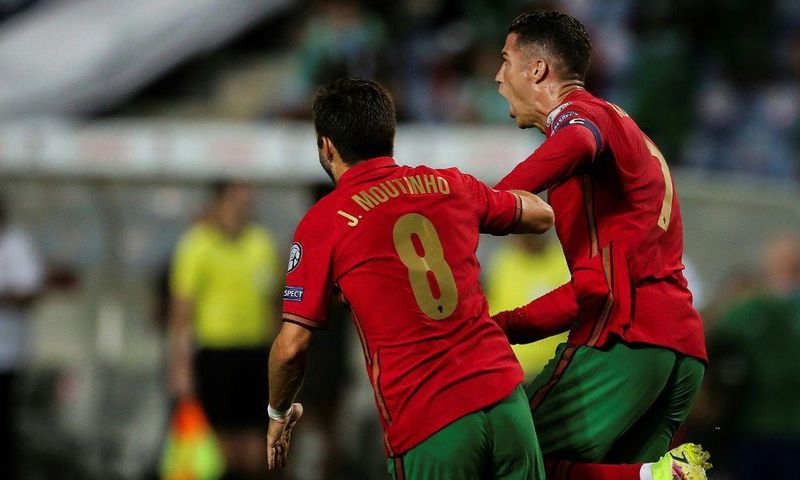 Cristiano Ronaldo (R) scored a dramatic late double to take his tally to 111 international goals
