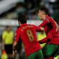 Cristiano Ronaldo (R) scored a dramatic late double to take his tally to 111 international goals