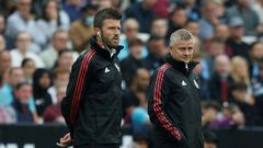 Michael Carrick (left) will take caretaker charge of Manchester United following the sacking of Ole Gunnar Solskjaer