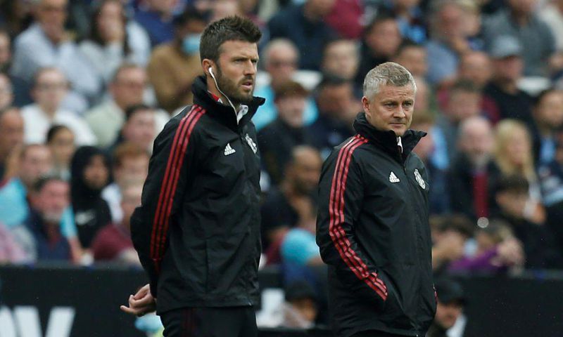 Michael Carrick (left) will take caretaker charge of Manchester United following the sacking of Ole Gunnar Solskjaer