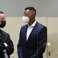 Germany defender Jerome Boateng (R) talks to his lawyer Kai Walden in Munich regional court on Thursday