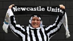 Newcastle United fans celebrated the club's takeover by a consortium led by the Saudi sovereign wealth fund