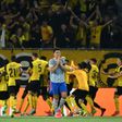 Harry Maguire walks away as Young Boys celebrate their last-gasp winner in Bern