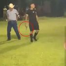 The referee with a gun in his hand