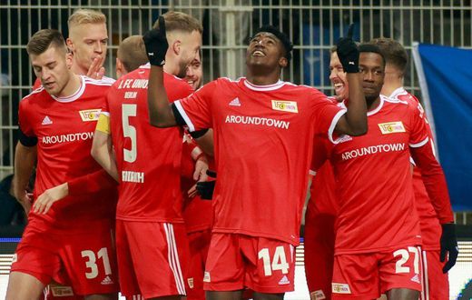 Union Berlin's Nigerian forward Taiwo Awoniyi (C) has been on sizzling form