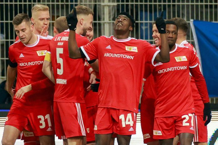 Union Berlin's Nigerian forward Taiwo Awoniyi (C) has been on sizzling form