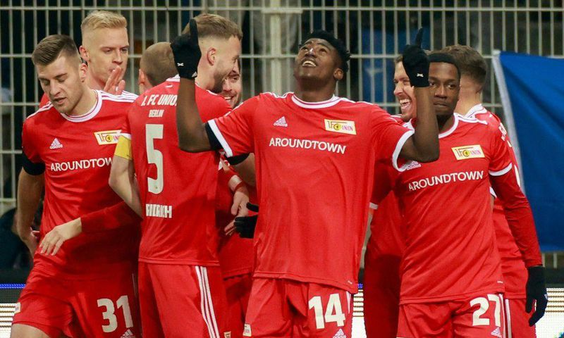 Union Berlin's Nigerian forward Taiwo Awoniyi (C) has been on sizzling form