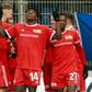 Union Berlin's Nigerian forward Taiwo Awoniyi (C) has been on sizzling form