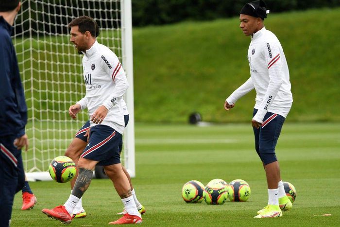 Kylian Mbappe with Lionel Messi at PSG's training session on Thursday
