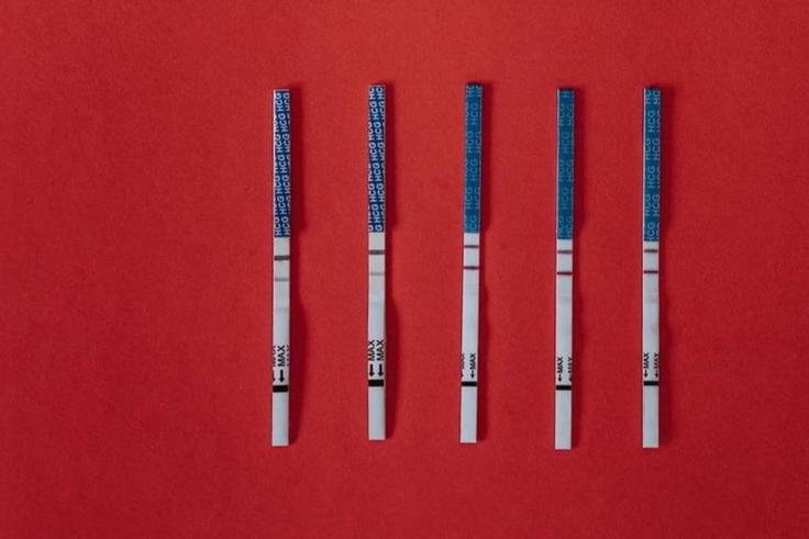 Close-up shot of positive pregnancy test strips [Image: Olia Danilevich]