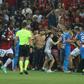 The match between Nice and Marseille was halted in the 75th minute as bottles were thrown and fans invaded the pitch