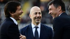 Milan's CEO Ivan Gazidis (C) previously worked with Arsenal.