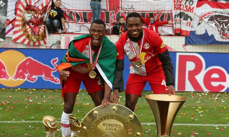 Leicester bound - Zambia forward Patson Daka (L), pictured with compatriot Enock Mwepu celebrating Salzburg's Bundesliga title on May 22,