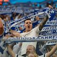 Finland fans cheer on their team against Belgium in Russia