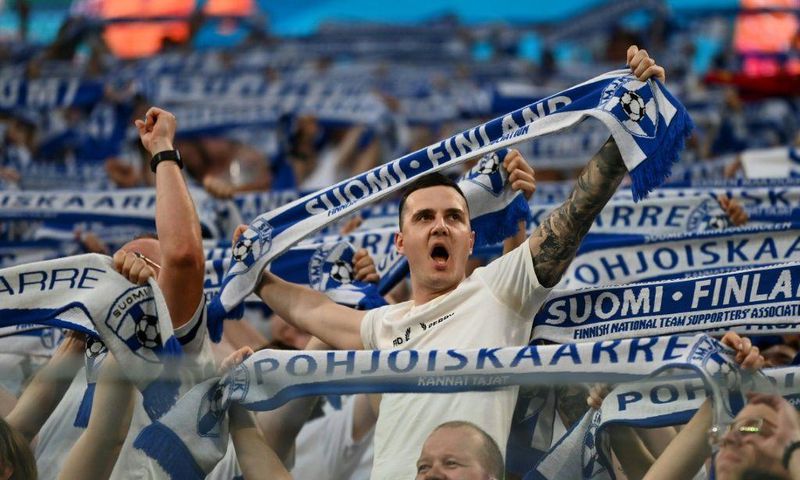 Finland fans cheer on their team against Belgium in Russia
