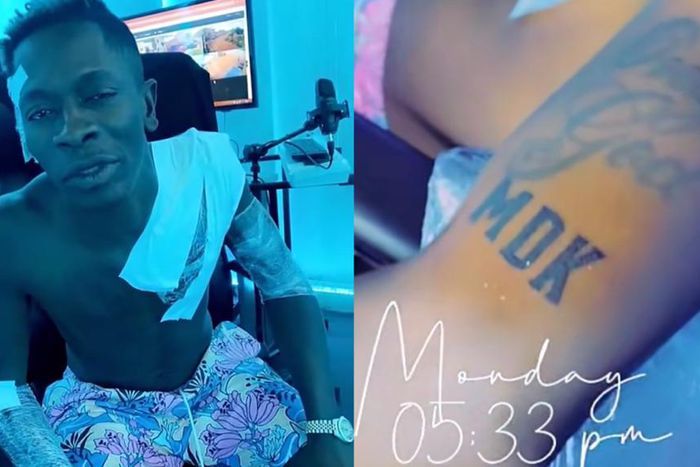Shatta Wale tattoos Medikal's name on his body (WATCH)