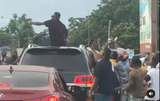 Shatta Wale sprays cash in Ada