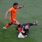 Borussia Dortmund are reportedly chasing Netherlands forward Donyell Malen (L)