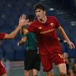 On target: Roma's Eldor Shomurodov  (right)