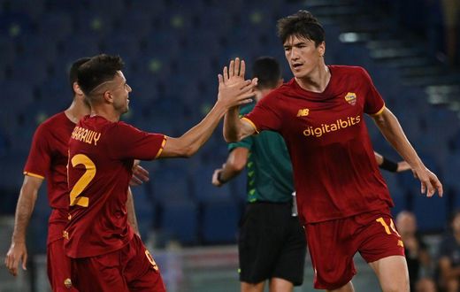 On target: Roma's Eldor Shomurodov  (right)