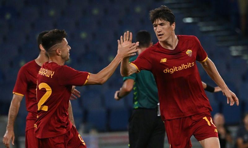 On target: Roma's Eldor Shomurodov  (right)