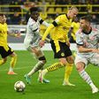 Bayern Munich defender Niklas Suele (R) managed to thwart Dortmund striker Erling Braut Haaland (C) on Tuesday in the German Super Cup