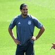 Germany defender Antonio Ruediger (R) chats with Emre Can during training on Monday in Herzogenaurach