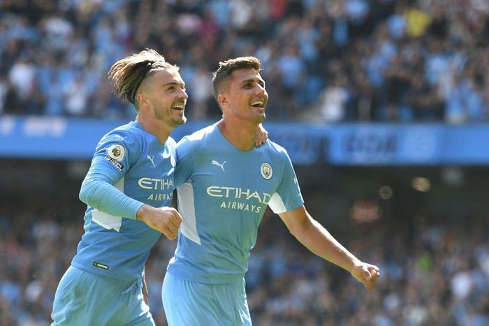 Rodrigo (right) scored Manchester City's fourth goal as they thrashed Arsenal