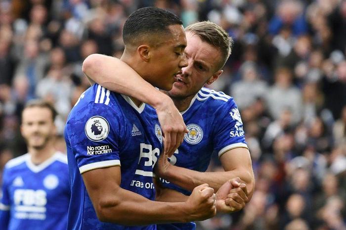 Leicester's Youri Tielemans and Jamie Vardy (R) celebrate against Manchester United