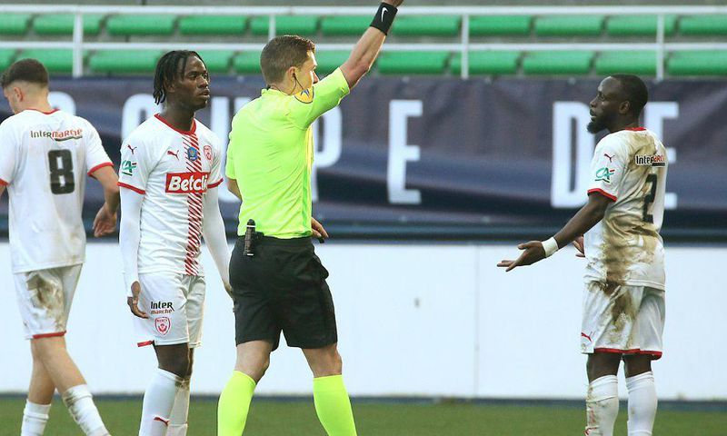 Souleymane Karamoko is shown a red card at Troyes to leave Nancy with eight men