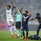 Bordeaux and Marseille's players call for medical help as Samuel Kalu lies on the ground