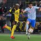 Cristiano Ronaldo battles with Mohamed Ali Camara during Manchester United's defeat against Young Boys