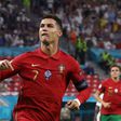 Cristiano Ronaldo celebrates after his record-equalling goal