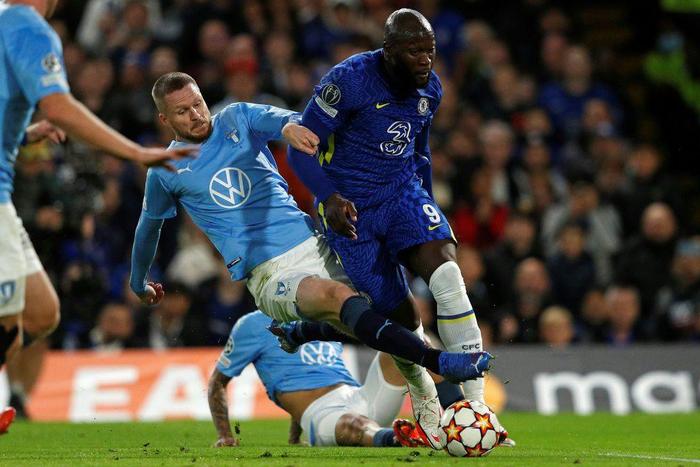 Malmo defender Lasse Nielsen fouls Chelsea striker Romelu Lukaku