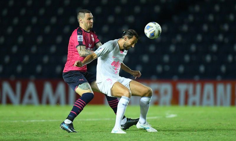 Record breaker: Hong Kong's Kitchee's Dejan Damjanovic (right) in action