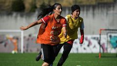 Players of Afghanistan national women's youth football team attend a training session on the outskirts of Lisbon where they have found safe haven after escaping from the Taliban