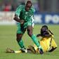 Enyimba coach Finidi George (L) playing for Nigeria against Ghana during the 2002 Africa Cup of Nations in Mali.