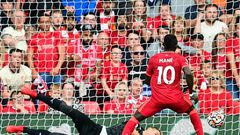 Senegalese Sadio Mane (R) scores his 100th goal for Liverpool in a 3-0 victory over Crystal Palace at Anfield