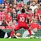 Senegalese Sadio Mane (R) scores his 100th goal for Liverpool in a 3-0 victory over Crystal Palace at Anfield