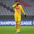 Gerard Pique (L) and Philippe Coutinho at the end of Barcelona's 3-0 defeat at the hands of Bayern Munich that sent them packing from the Champions League