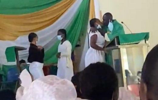 Anglican Priest kissing students