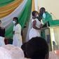 Anglican Priest kissing students