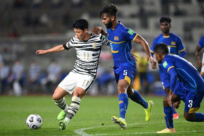 South Korea's Hwang Hee-chan (L) has joined Wolves