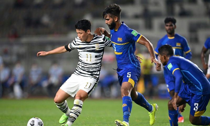 South Korea's Hwang Hee-chan (L) has joined Wolves